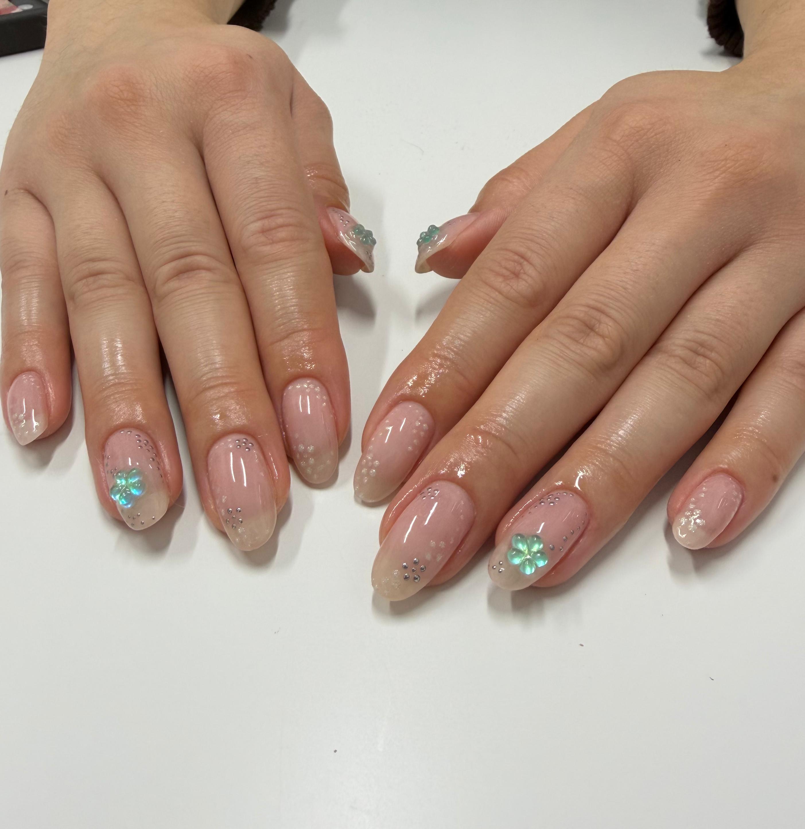 Sheer nude nail art with tiny flowers by Jessica
